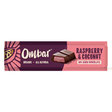 Ombar organic dark chocolate wrapper in burgundy and pink, featuring a chocolate square and raspberry-coconut flavor label; bold, colorful packaging.