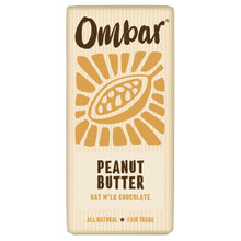 An Ombar oat milk chocolate wrapper featuring a bold peanut butter label and golden peanut illustration, promoting natural, fair-trade ingredients.