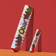 Two Obar chocolate bars in their striped wrapper, standing on an orange surface against a solid red background. To show size comparison between original o'bar and the mini o'bar.
