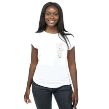 A smiling woman with long black hair wearing a white short-sleeve crewneck t-shirt with a black line pencil sketch art graphic of a pig and a speech bubble that reads 'Free all pigs'.