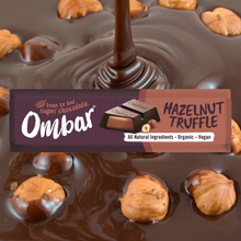 Ombar Hazelnut Truffle chocolate bar with hazelnuts in a chocolate pool