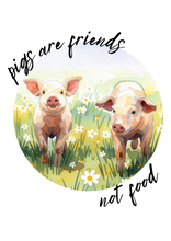 A circular watercolor-style graphic showing two piglets standing in a grassy field with small white flowers. Handwritten black text around the circle reads “pigs are friends not food.