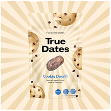 A cream-and-gold sunburst frames a True Dates flavoured dates pouch, with a date fruit and cookie-dough pieces; the packaging feels playful and appetising.