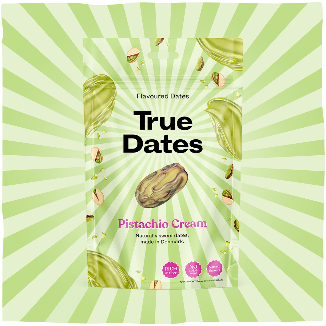 A green-and-white striped package for “True Dates” flavoured dates, with a pistachio-coated date illustration and pink “Pistachio Cream” text; fresh, playful design.