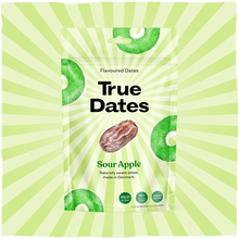A green-and-white packet of True Dates sour apple-flavoured dates sits against a lime-green sunburst background, giving the snack packaging a bright, playful tone.