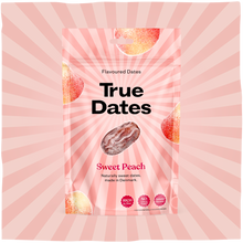 A pink True Dates Sweet Peach flavoured dates pouch with a central date and peach illustrations, set against a pink sunburst backdrop.